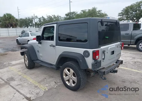 2011 Jeep Wrangler Sport z USA, uszkodzony, nr VIN 1J4AA2D11BL600750